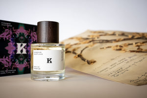 Kingdom Botanica bottle of perfume with box and plum blossom sample from the herbarium at the Royal Botanic Garden Edinburgh